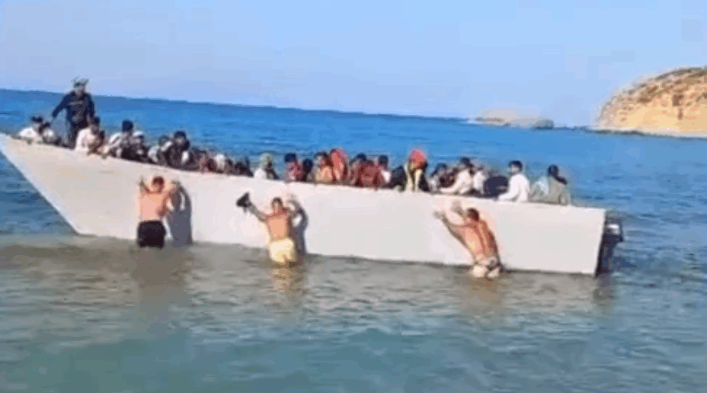 toeristen migrantenboot Griekenland