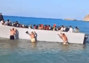 toeristen migrantenboot Griekenland